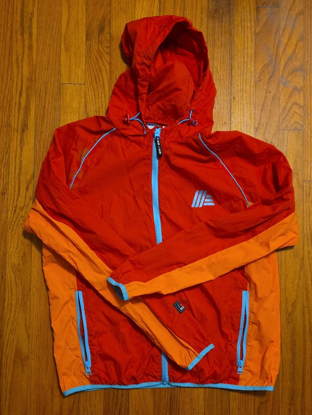 Aldi Gear Red & Orange Lightweight Hooded Windbreaker with Blue Trim